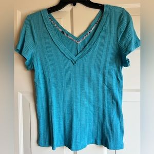 Pilcro brand for Anthropologie slightly cropped v-neck t shirt.